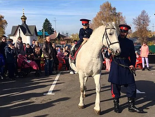 Посажение казака на коня